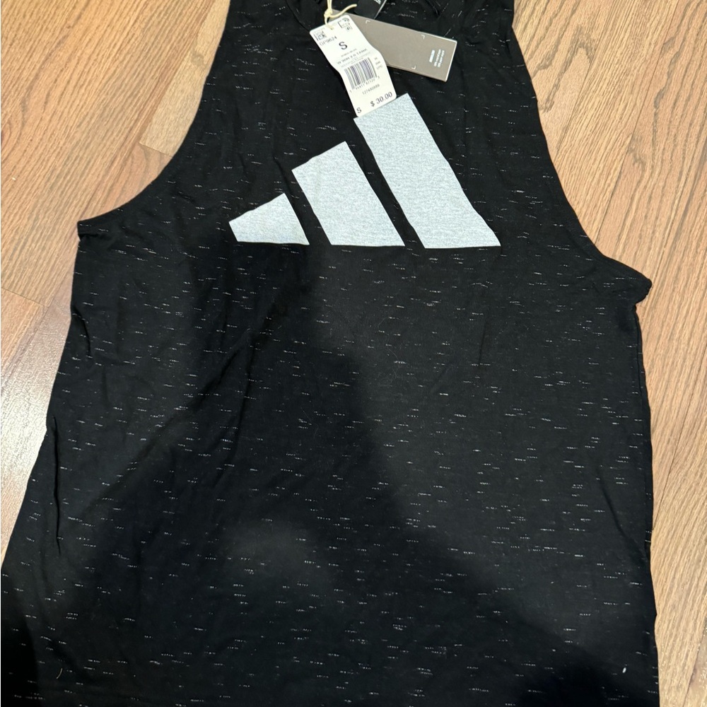 Adidas woman’s workout shirt.  New with tags